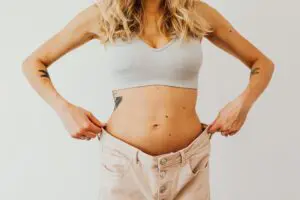 woman showing weight loss